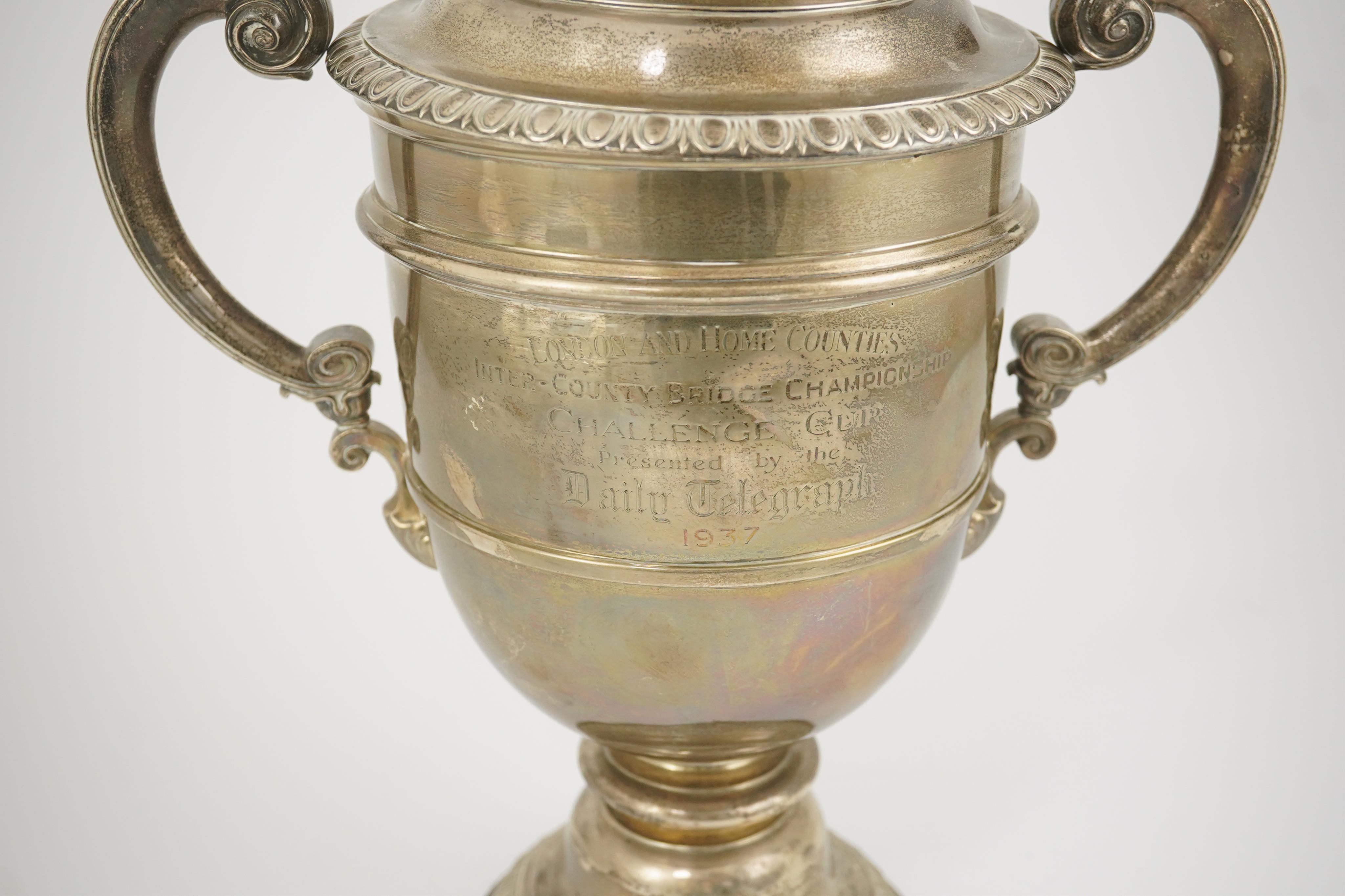 A George V silver two handled presentation trophy cup and cover by Hunt & Roskell Ltd (late Storr & Mortimer)